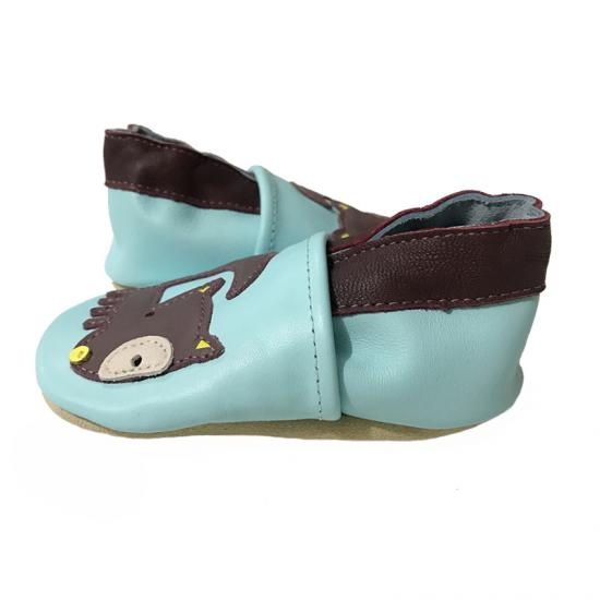 baby shoes with brown cat