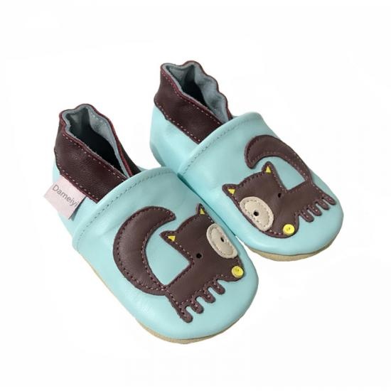 baby shoes with brown cat